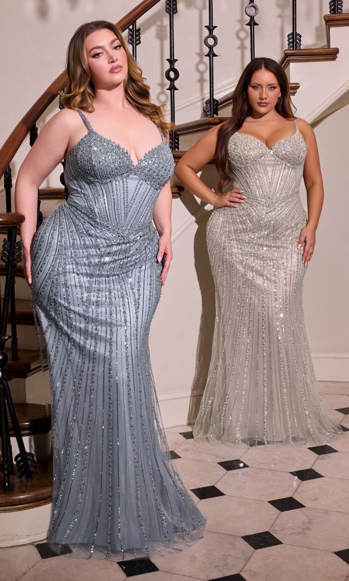 A woman wears the Ladivine CC398C long plus-size prom dress in smoky blue, standing on a staircase with black iron railings.